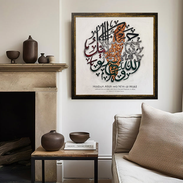 Framed calligraphy artwork on a wall above a fireplace in a living room.