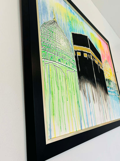 Framed artwork of a colorful depiction of religious sites on a white wall.